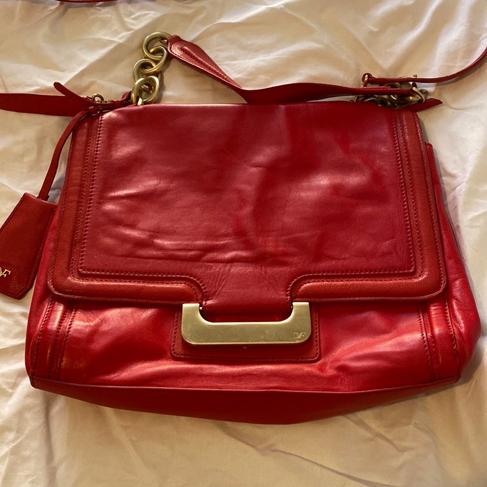 DVF purse in red. Great condition. With duster bag. Please see pictures.